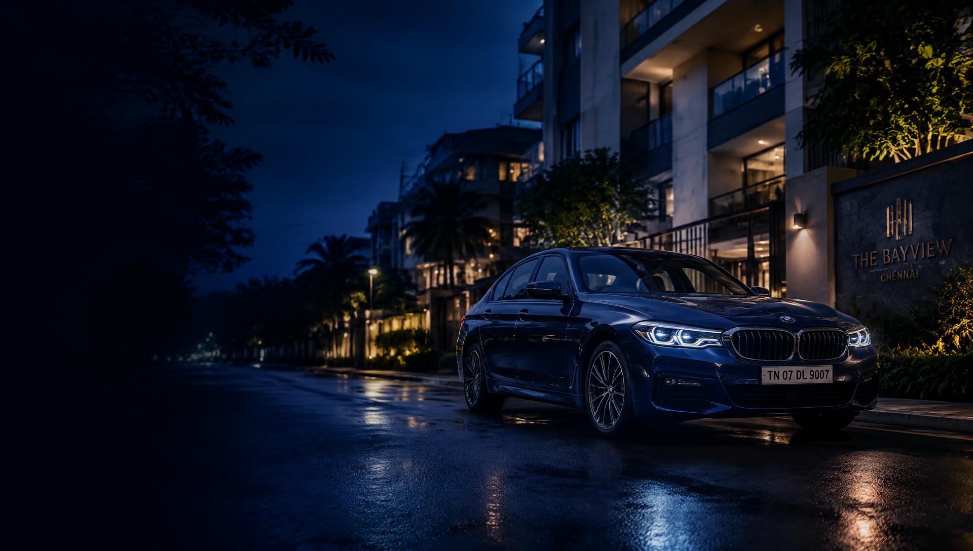 Premium sedan parked on a tree-lined residential street in Chennai at dusk